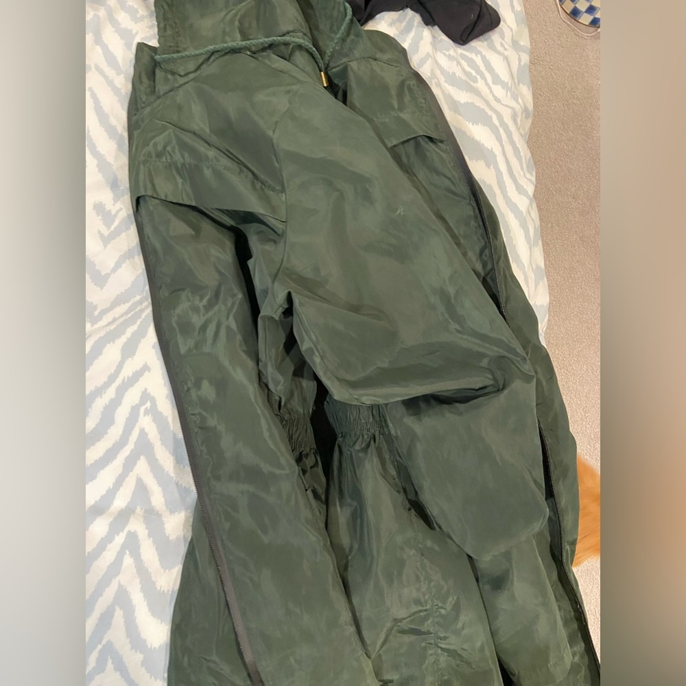 Green raincoat